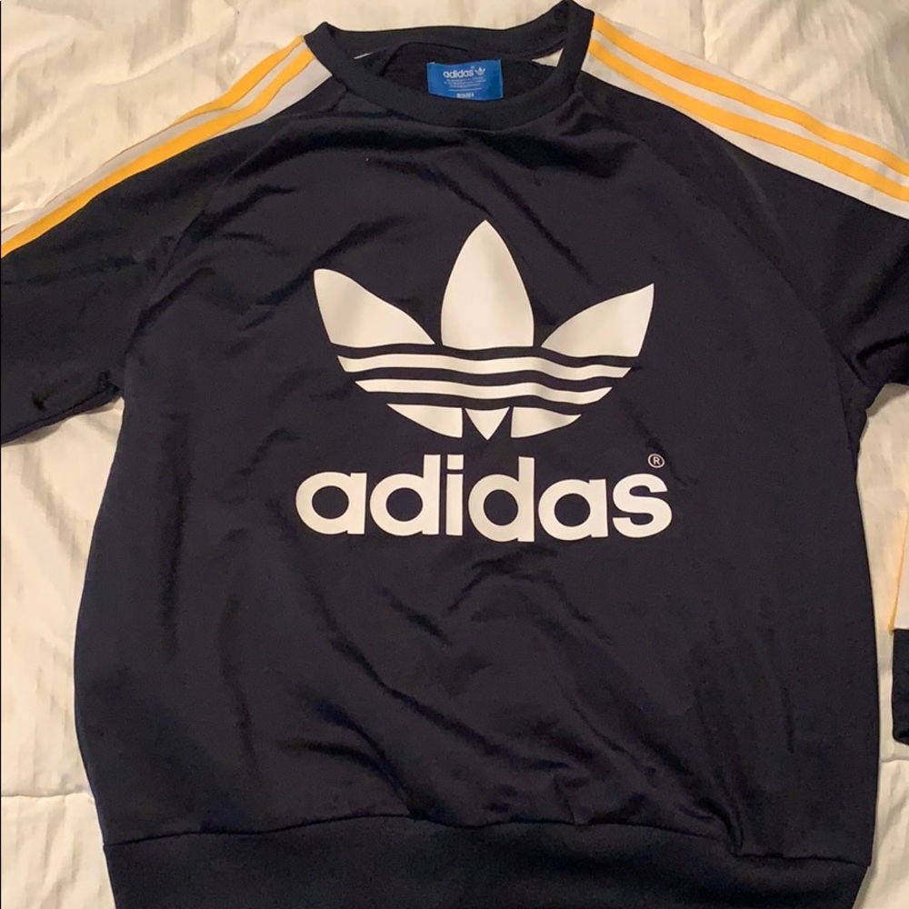 Adidas long sleeve top with buttons on the sleeves